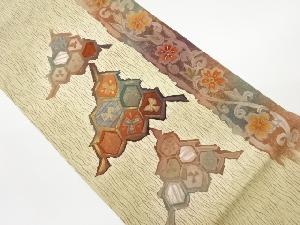 手織り紬金彩板締め絞り花唐草に抽象模様袋帯